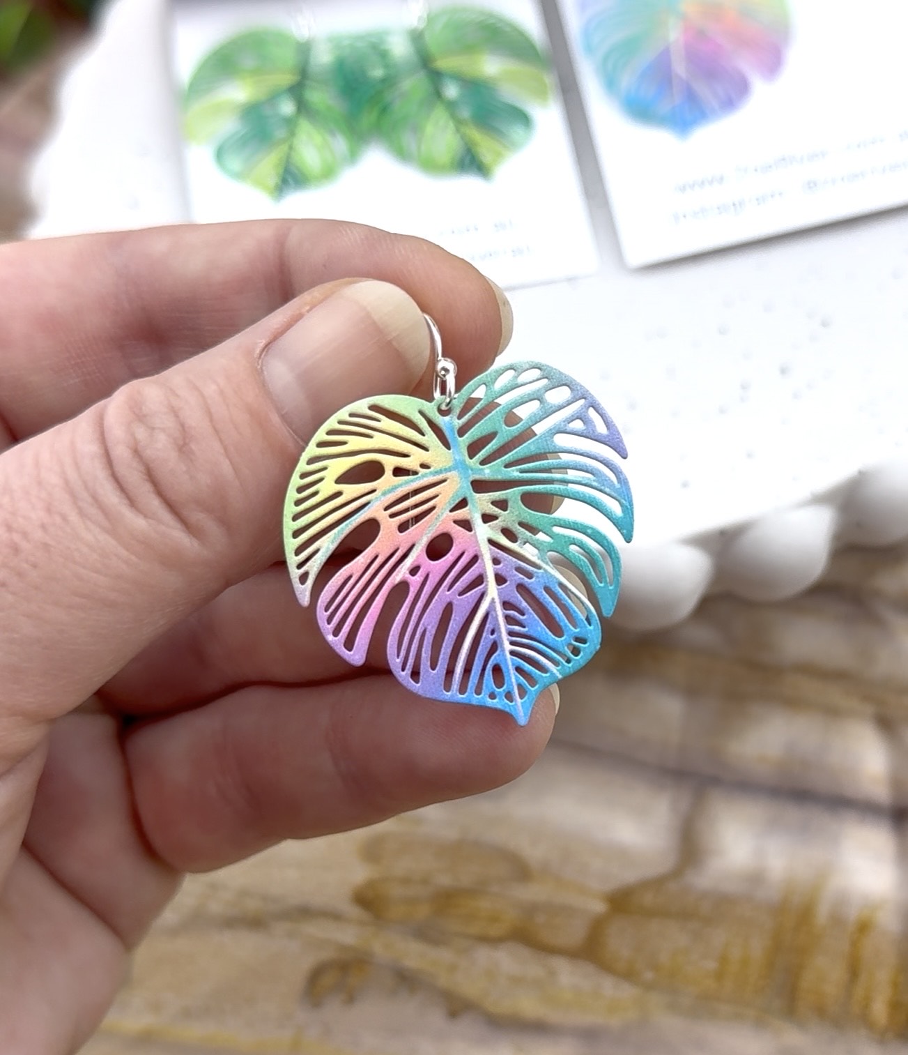 Monstera leaf filigree earrings. Your choice of 925 sterling silver, nickel free titanium or stainless steel, hypoallergenic earrings. Rainbow, colourful or green leaf earrings.