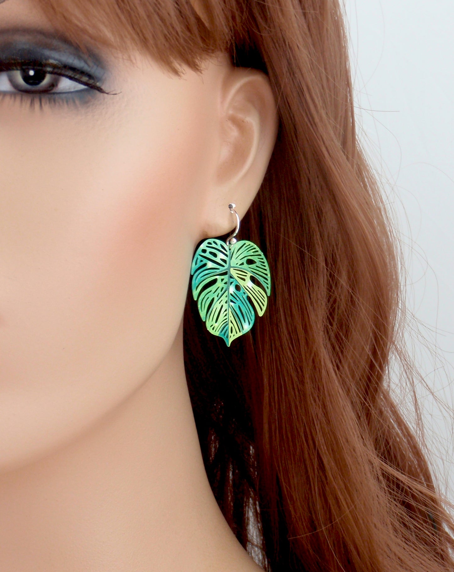 Monstera leaf filigree earrings. Your choice of 925 sterling silver, nickel free titanium or stainless steel, hypoallergenic earrings. Rainbow, colourful or green leaf earrings.