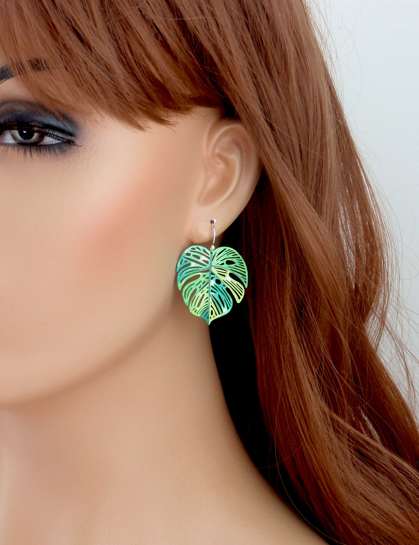 Monstera leaf filigree earrings. Your choice of 925 sterling silver, nickel free titanium or stainless steel, hypoallergenic earrings. Rainbow, colourful or green leaf earrings.