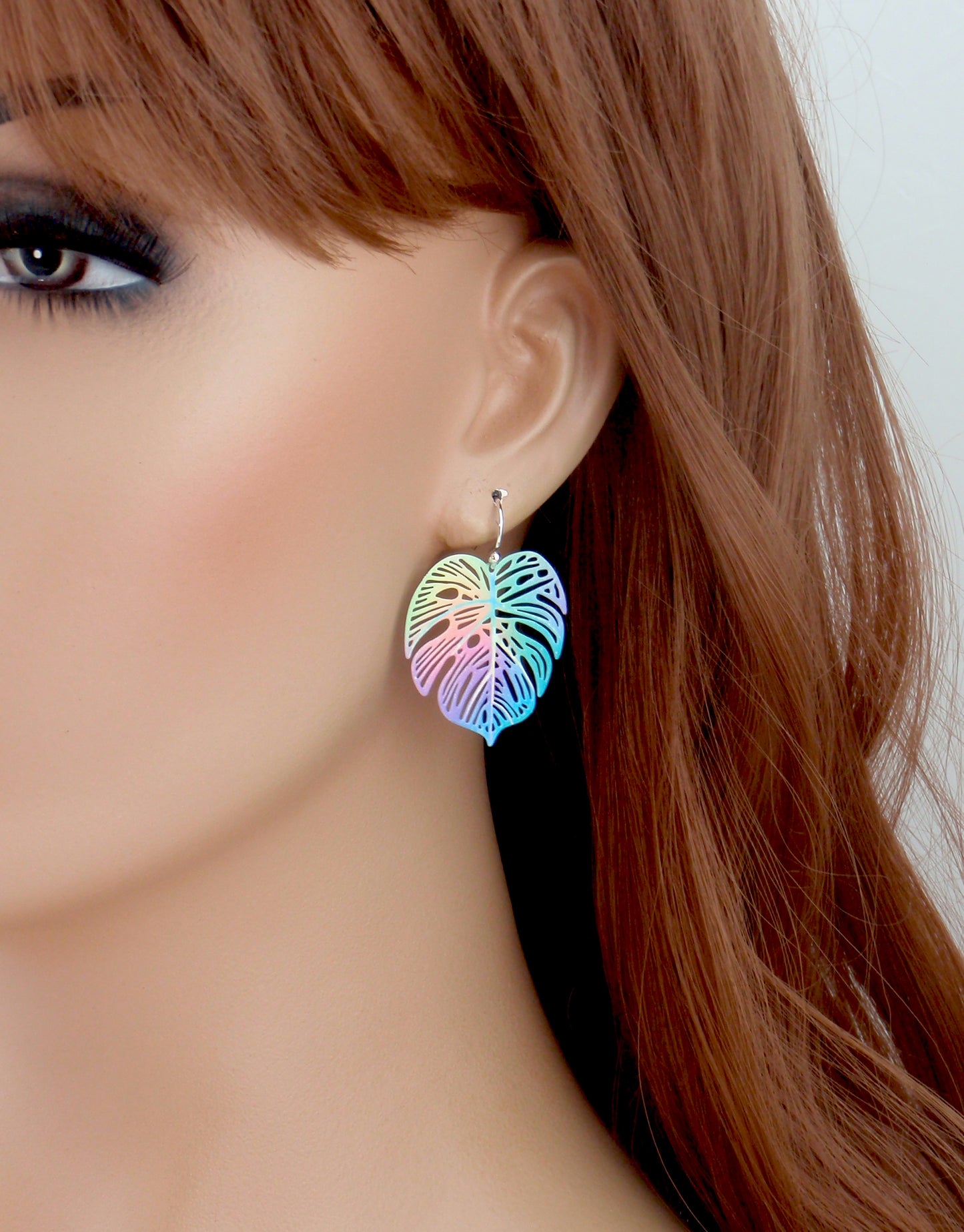 Monstera leaf filigree earrings. Your choice of 925 sterling silver, nickel free titanium or stainless steel, hypoallergenic earrings. Rainbow, colourful or green leaf earrings.