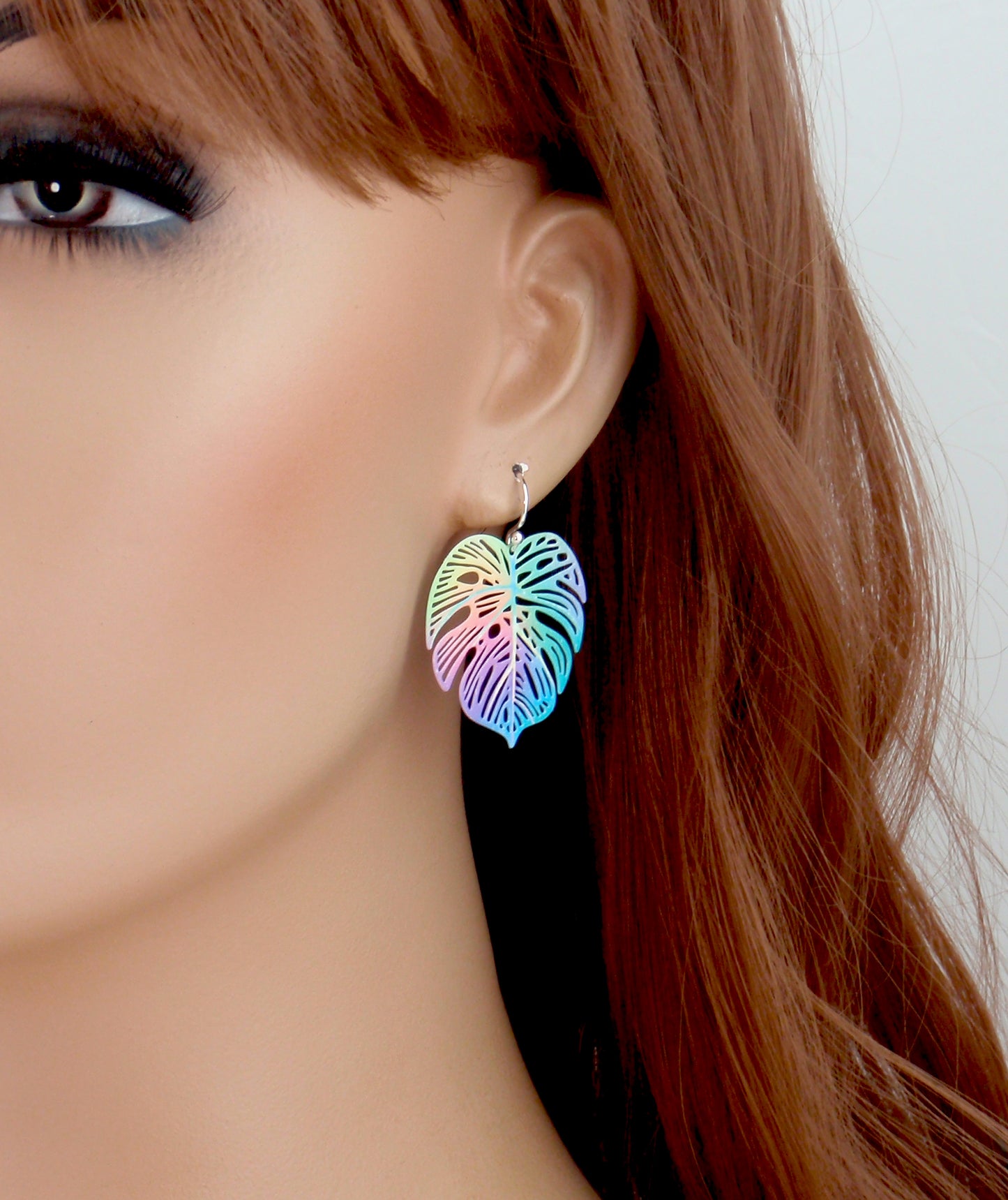 Monstera leaf filigree earrings. Your choice of 925 sterling silver, nickel free titanium or stainless steel, hypoallergenic earrings. Rainbow, colourful or green leaf earrings.