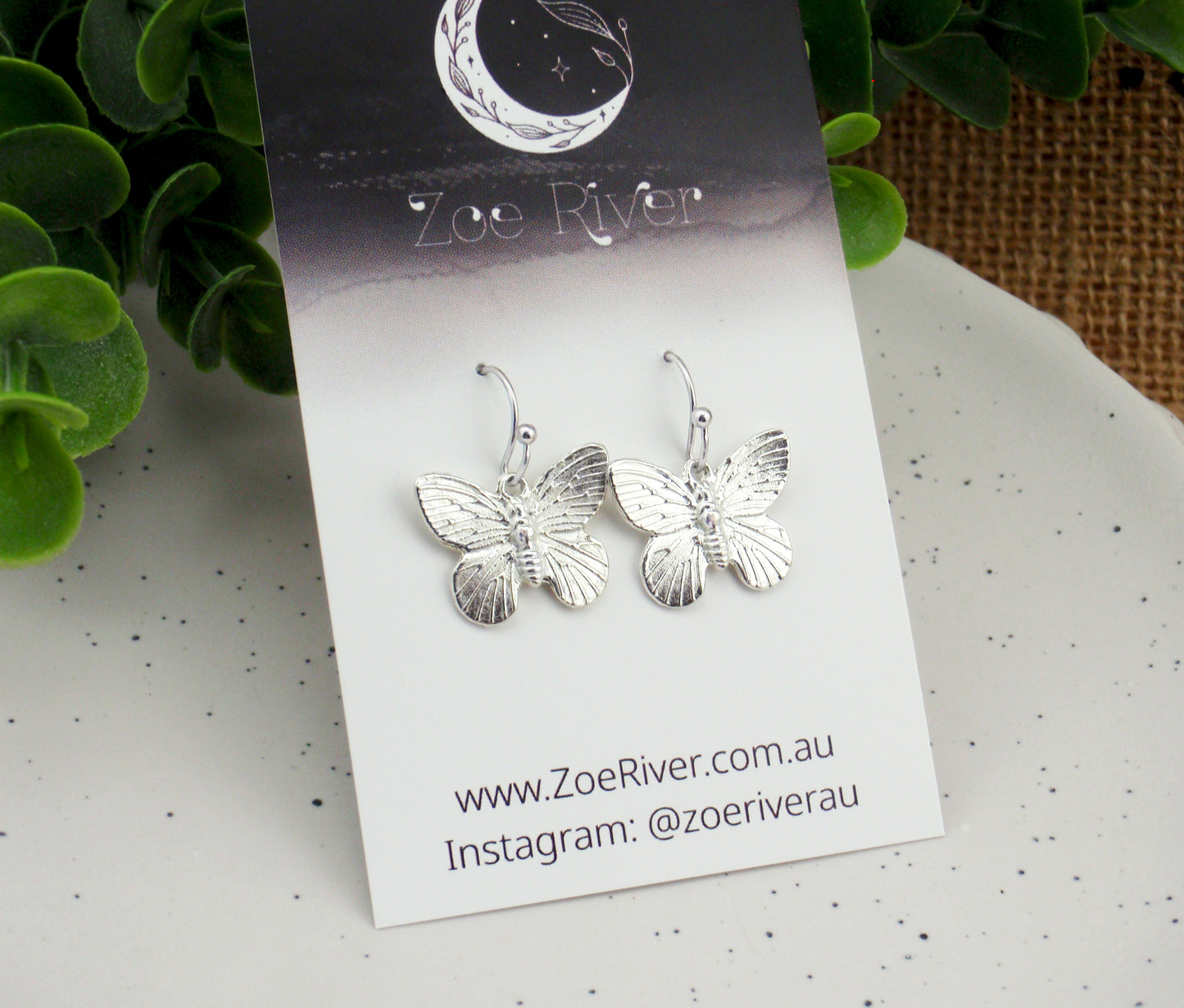 Dainty silver butterfly earrings. Choose from Stainless steel, nickel free titanium or 925 sterling silver earwires. Small butterfly earrings