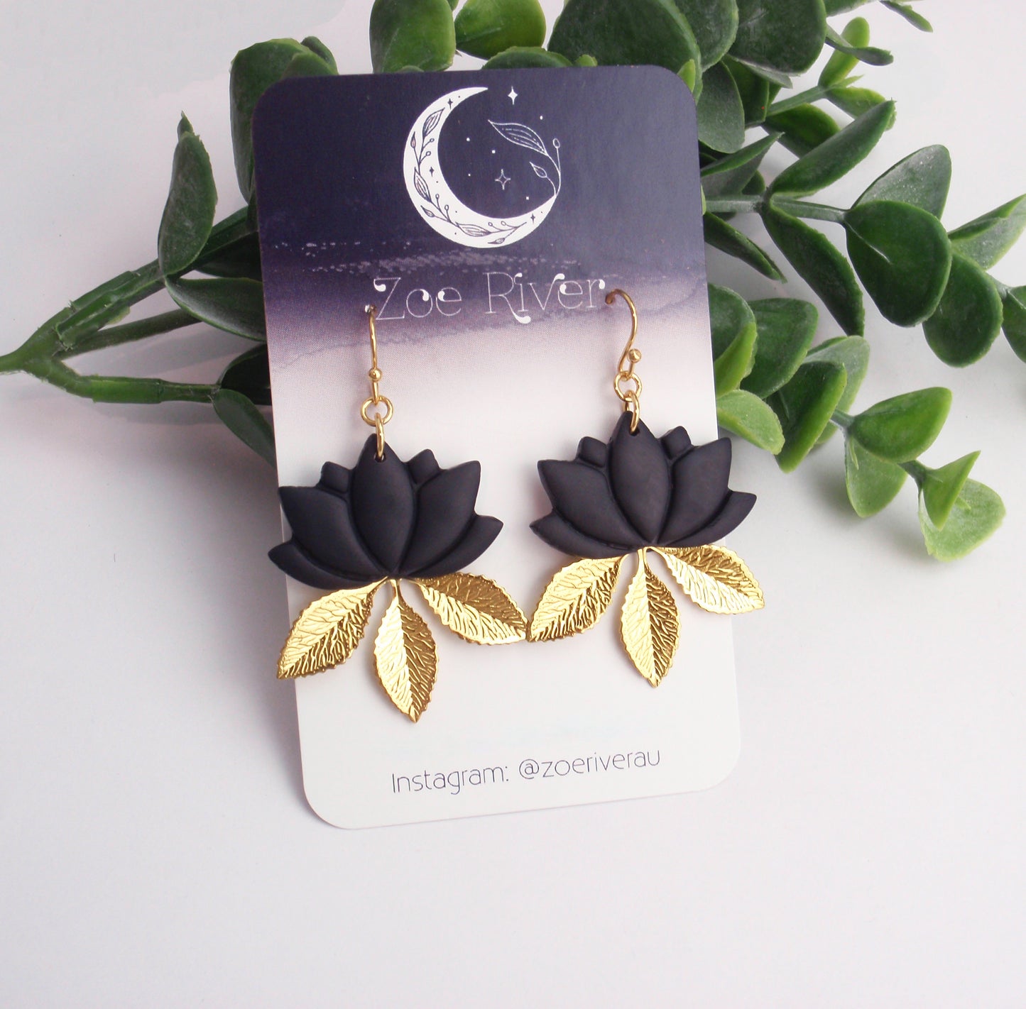 Lightweight black lotus, gold leaf branch earrings. Your choice of 14k gold filled, stainless steel or nickel free brass earwires. Zen, om, lightweight statement earrings