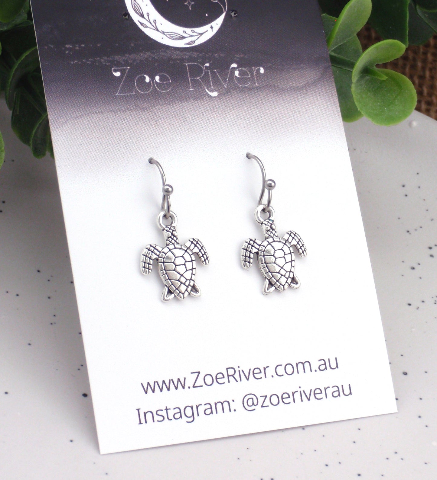 Dainty silver turtle earrings. Choose from Stainless steel, nickel free titanium or 925 sterling silver earwires. Small turtle earrings